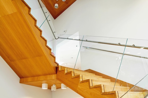 Modern interior with wooden stairs