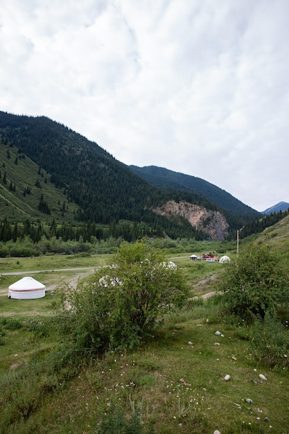 Modern Kazakh tourism in the style of a nomadic lifestyle in yurts near the mountains