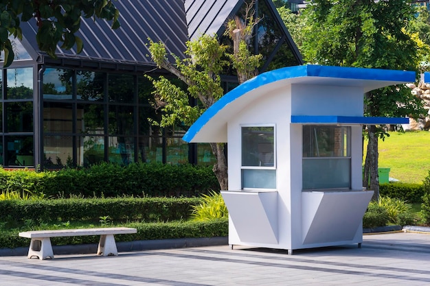 Modern kiosk on tile courtyard in public outdoor area