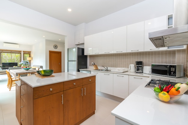 Modern kitchen feature island counter and appliance