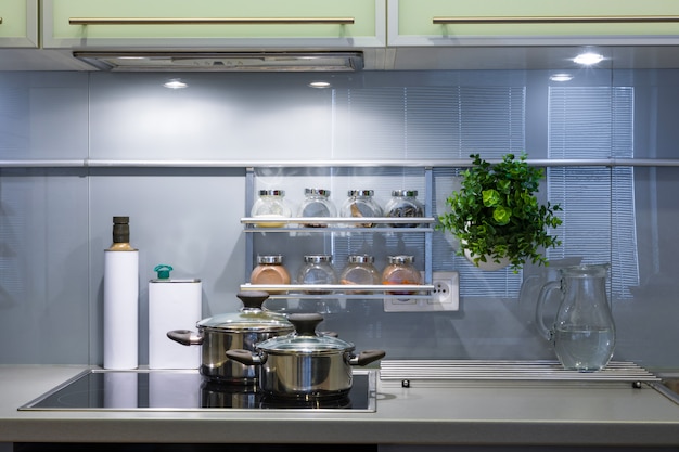 Modern kitchen at home with kitchenware