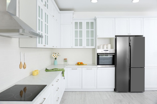 Modern kitchen interior with stylish white furniture