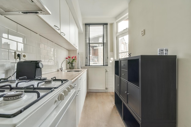 Modern kitchen with kitchenware and appliances