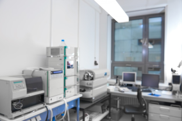 Modern laboratory interior out of focus, including equipment