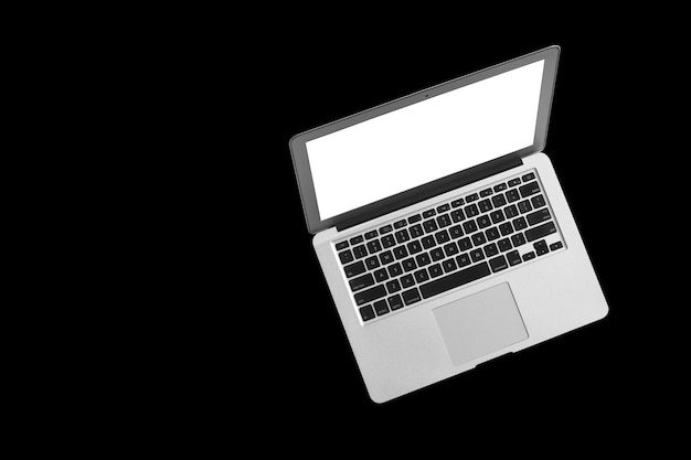 A modern laptop computer on black background