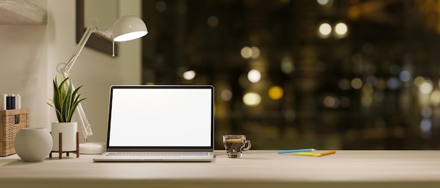 Modern laptop computer on working desk in modern office studio 3d rendering