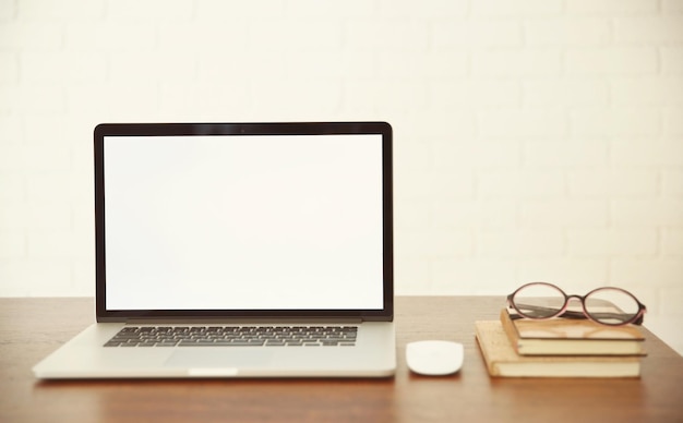 Modern laptop on wooden desk