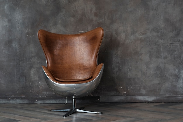 Modern leather armchair in studio