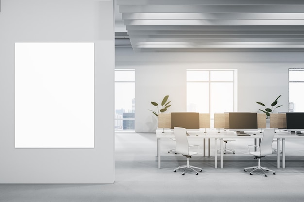 Modern light concrete and wooden coworking office interior with
empty mock up banner on wall furniture equipment window with city
view and sunlight workplace and loft space concept 3d
rendering