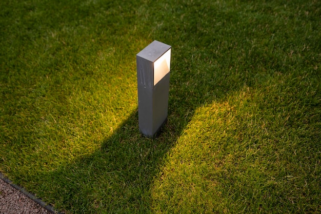 Modern light source outdoors in the garden of landscape design