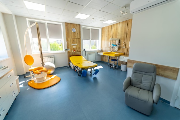 Modern light ward of maternity hospital empty patient beds in a
maternity ward