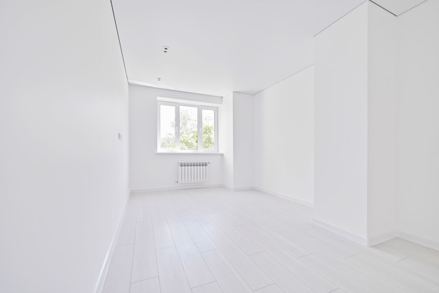 Modern light white empty living room with window. No people