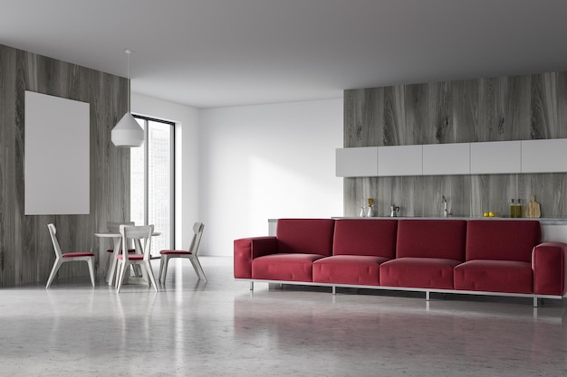 Modern living room interior with white and wooden walls, a red sofa and a table with chairs around it. A poster. 3d rendering mock up