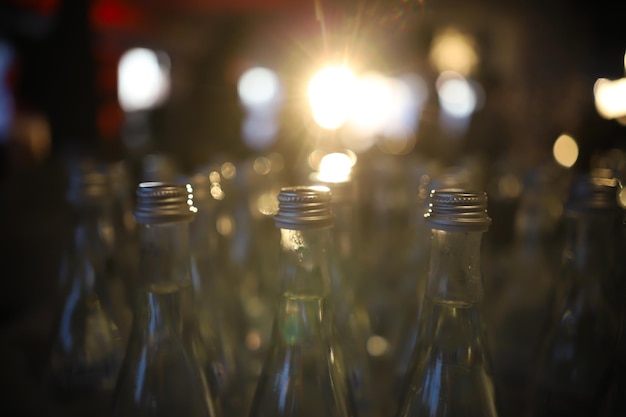 Modern loft bar style bottles of water on the stand