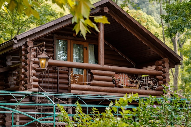 Modern Log Cabin Home in a Forest Environment