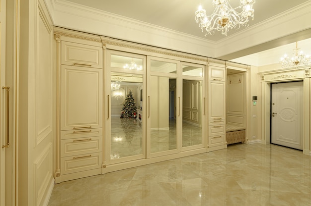 Modern luxury beige and golden entrance hall