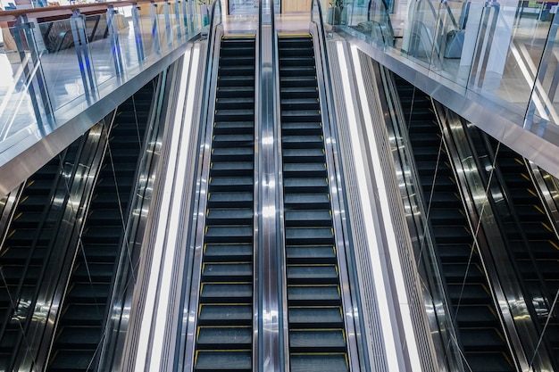 Modern luxury escalators with staircase at airport