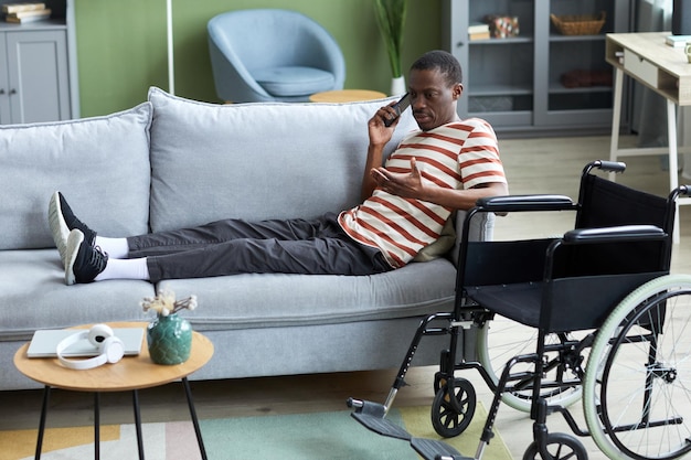 Modern Man with Disability at Home