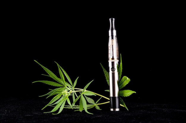 Photo modern metal electronic cigarette e cig vaporizer and cannabis