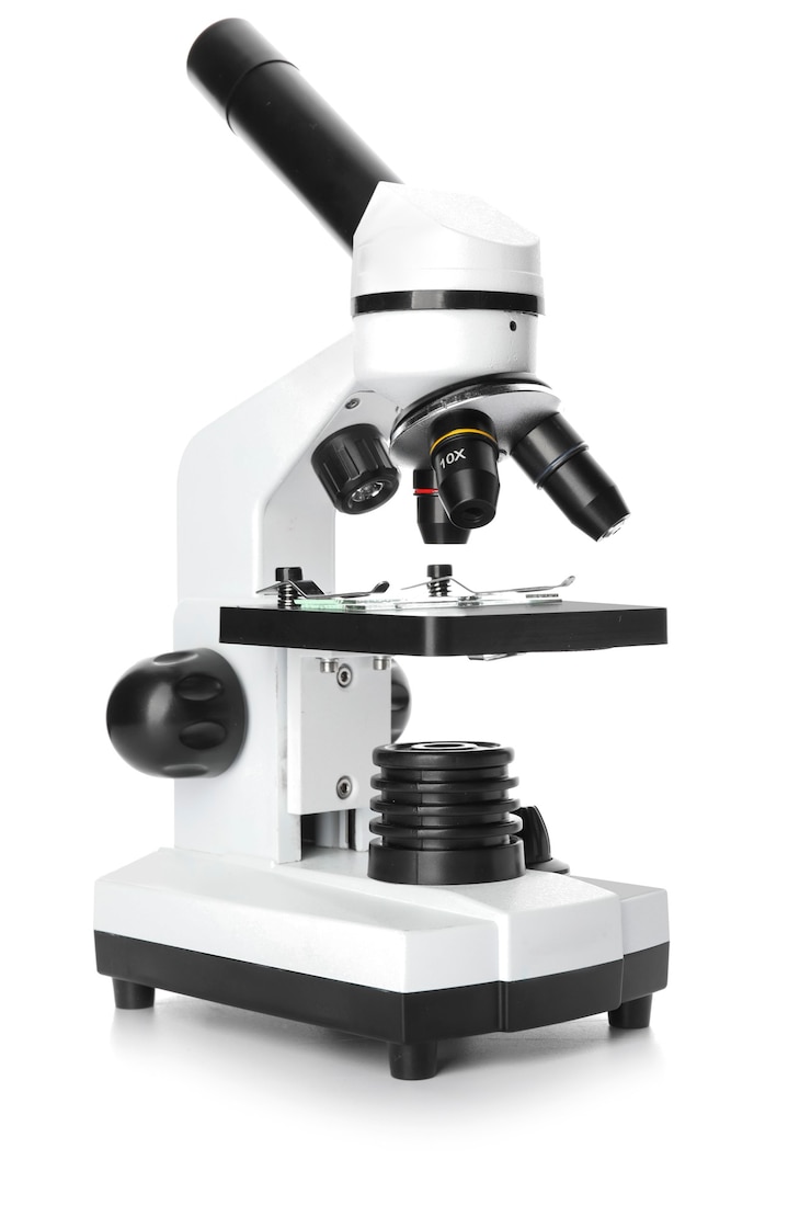 Photo modern microscope on white surface