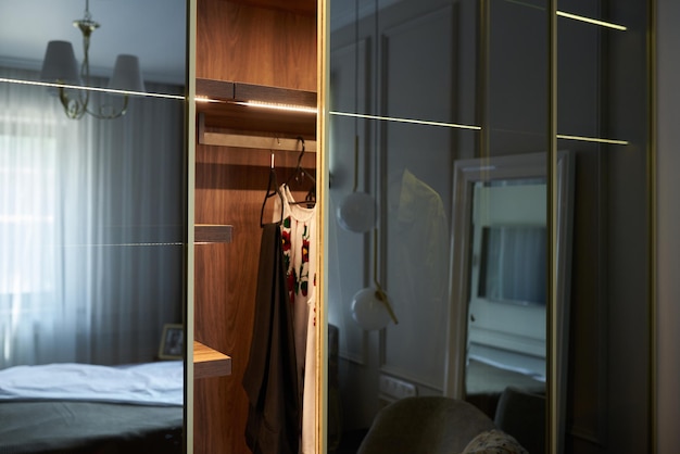 Modern mirror wardrobe in the bedroom