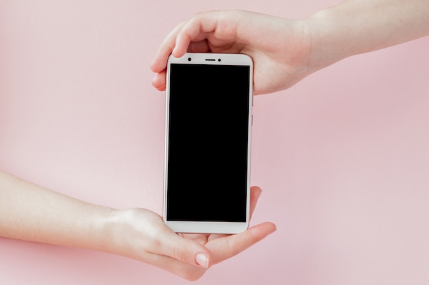 Modern mobile phone in a woman's hand