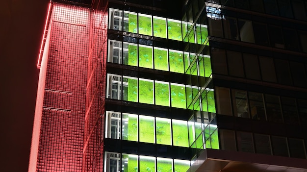 Modern office building in city at the night View on illuminated offices of a corporate building