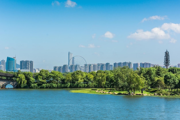 Modern office building and green park in shanghai china