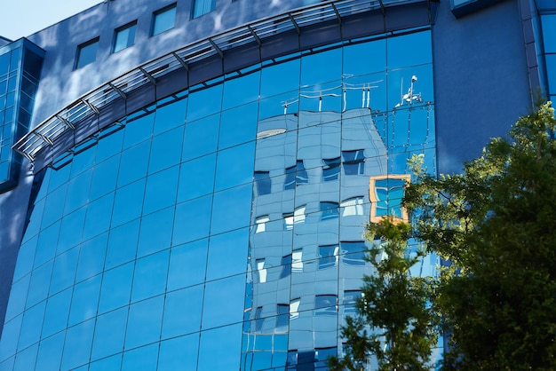 Modern office building with green trees