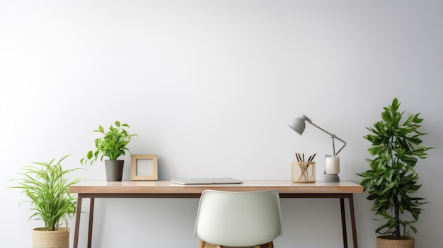 A modern office desk against a clean white wall complements neutral grays with pops of green from indoor plants