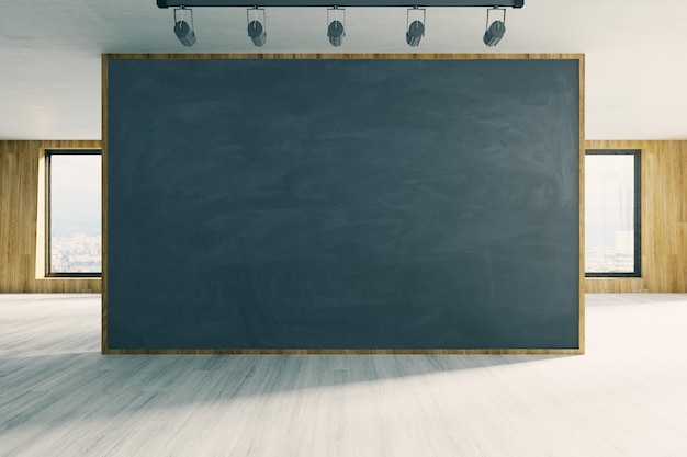 Modern office with blank chalkboard