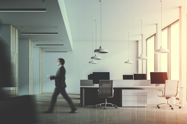 Modern office with white and dark wooden walls, a concrete floor and rows of computer tables. Wooden columns. Business people 3d rendering mock up toned image double exposure blurred