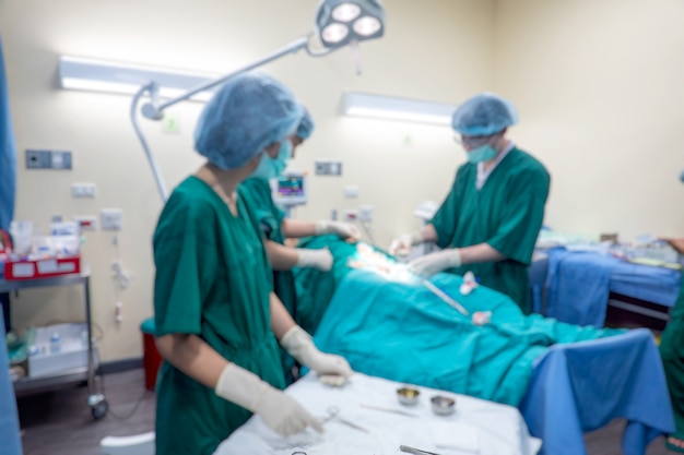 modern operating room at hospital with Group of surgeons in operating room