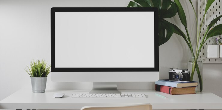 Photo modern photographer workplace with blank screen desktop computer with camera