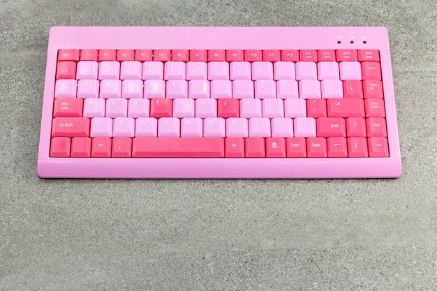 Modern pink keyboard with thin keys