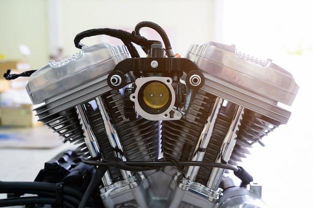 Modern powerful motocycle engine .Motocycle engine part with sunlight.