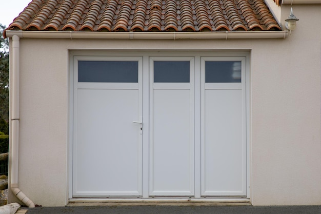 Modern private house suburb with garage white polyvinyl chloride door pvc entrance