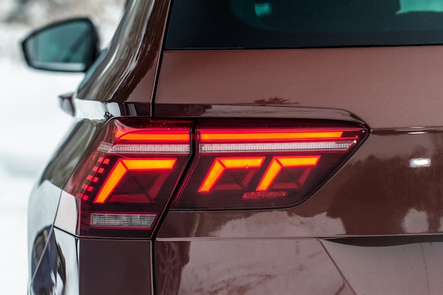 Modern rear light of a car Brake light and arrow of large suv Rear light of car close up view Tail light