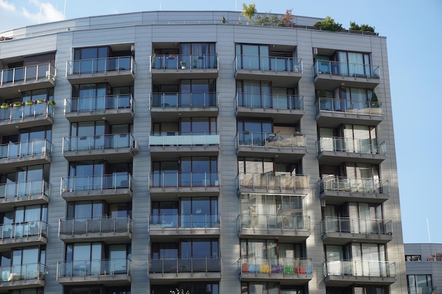 Modern residential building with balconies Real estate and housing issues concept