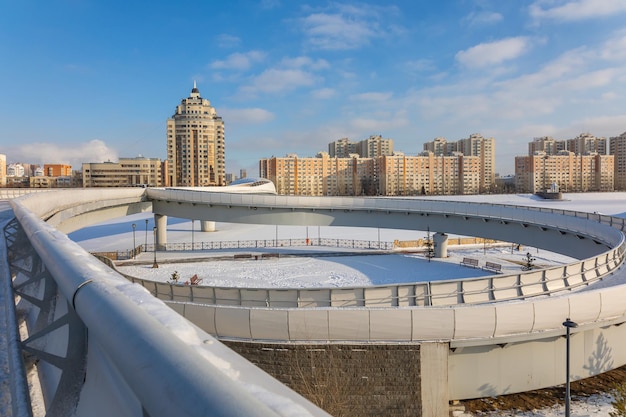 Современные жилые дома в солнечный зимний день НурСултан Астана Казахстан