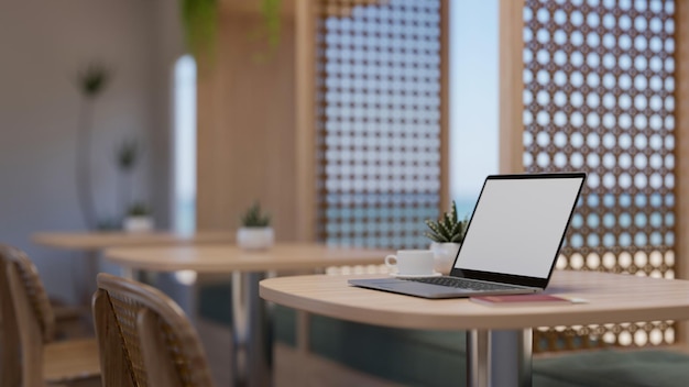 Modern restaurant of coffeeshop zithoek interieur met een draagbare laptop