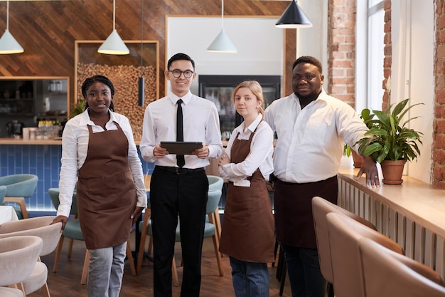 Modern restaurant staff group portrait