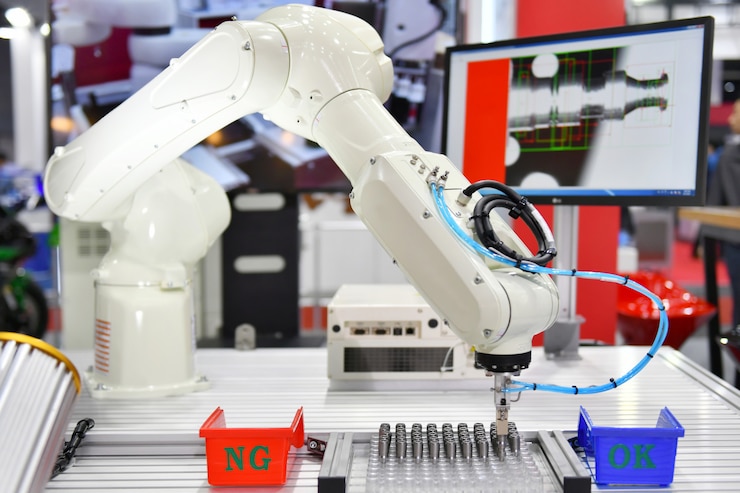 Photo 工場内の最新のロボットマシンビジョンシステム