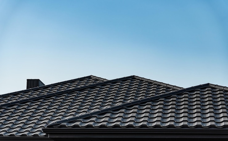 Photo modern roof covered with black metal tiles roof metal sheets building