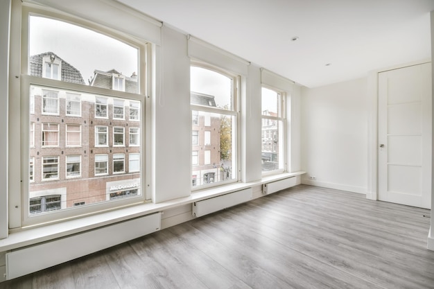 Modern room with wooden floor and white walls