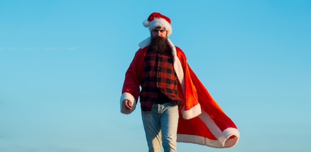 Modern Santa man-concept Moderne modieuze hipster Santa buiten