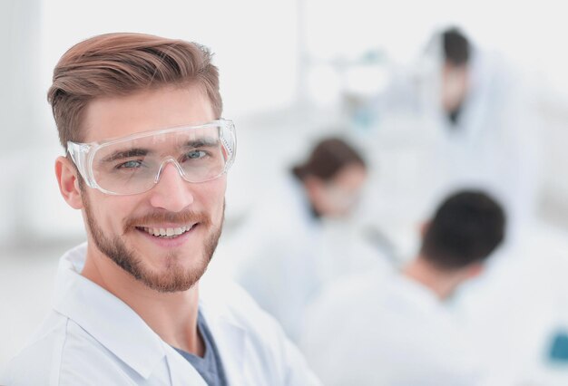 Modern scientist on laboratory background