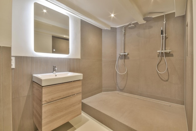 Modern shower in bathroom in apartment