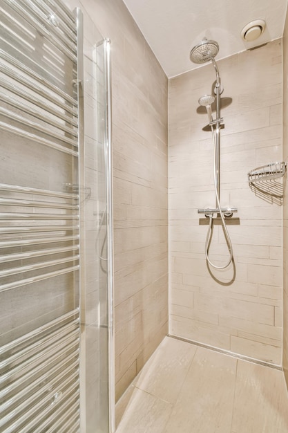 Modern shower cubicle in beige tone
