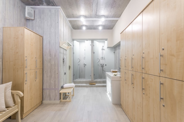 Photo modern shower room interior with wardrobes